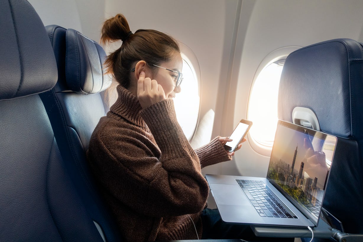 How To Deal With Flight Anxiety This Holiday Season, According To Experts